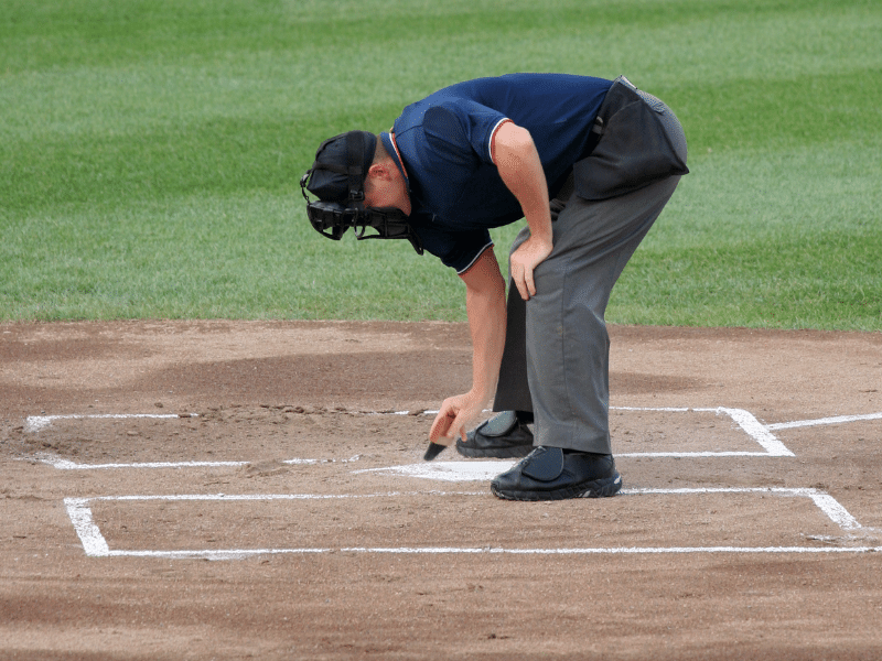 Umpire training writing on the ground