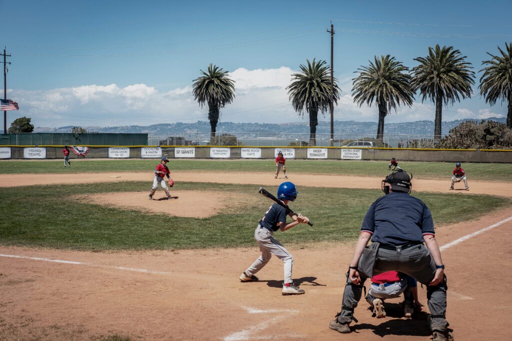 outfielders using baseball gloves